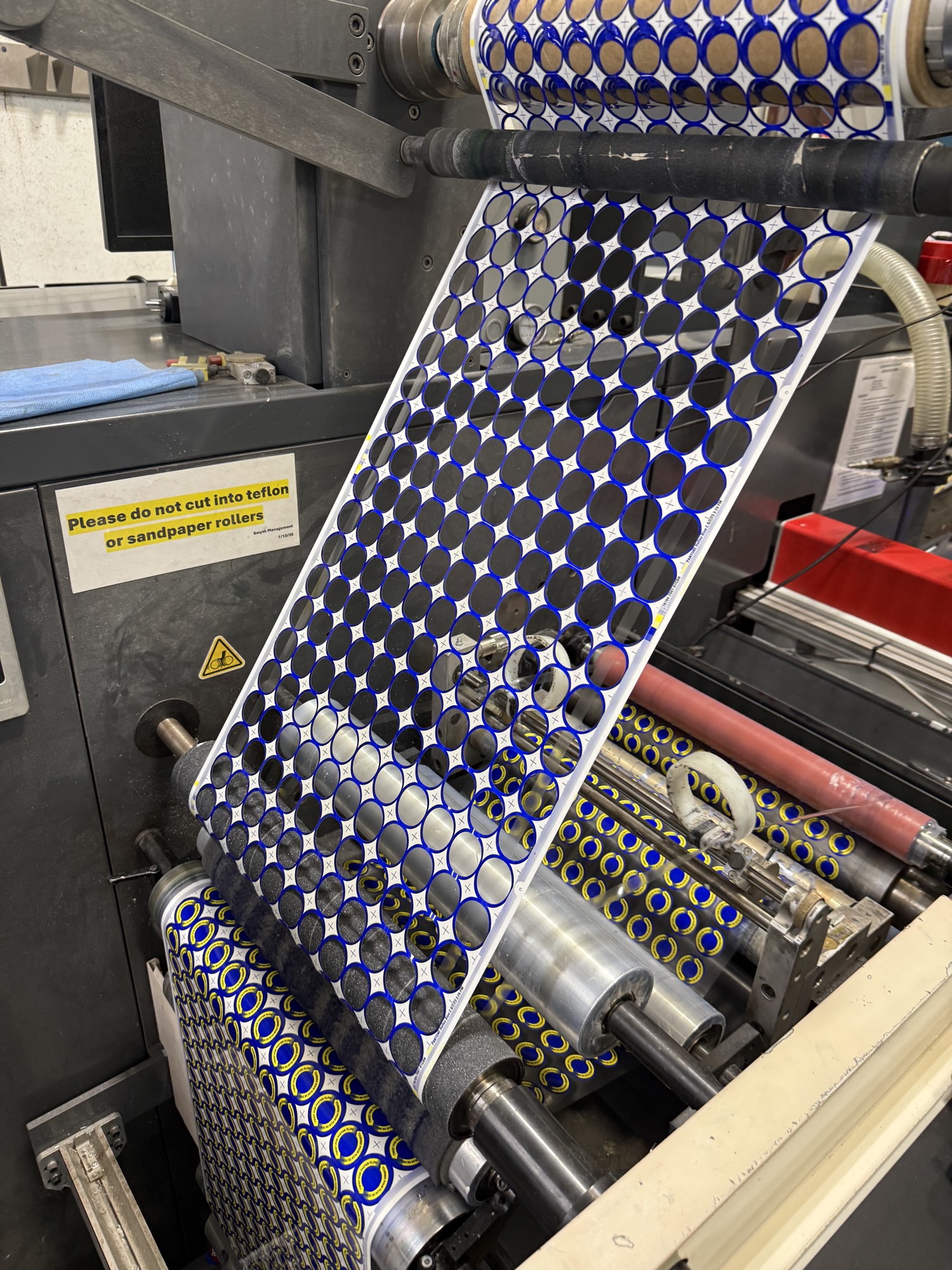 Die cutting circular labels on our press